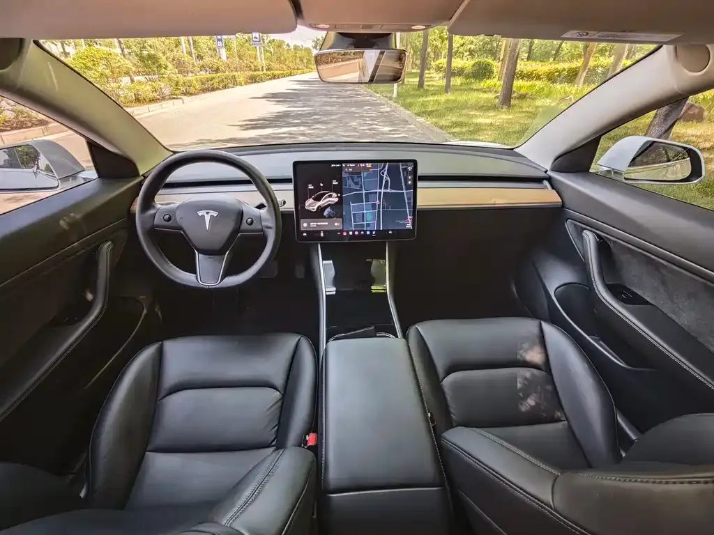 Tesla Model 3 — фото 9