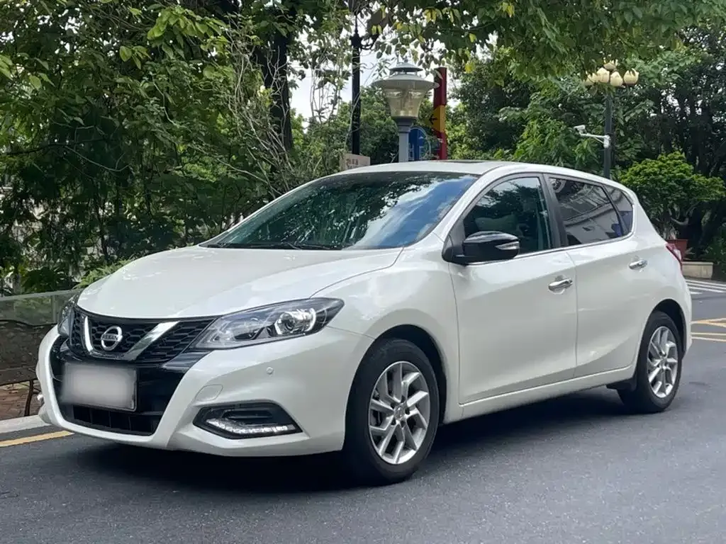 Nissan Tiida — фото 10