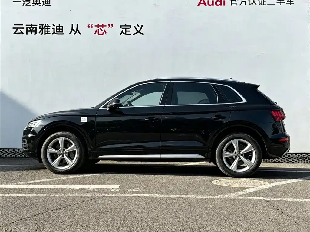 Audi Q5L — фото 10