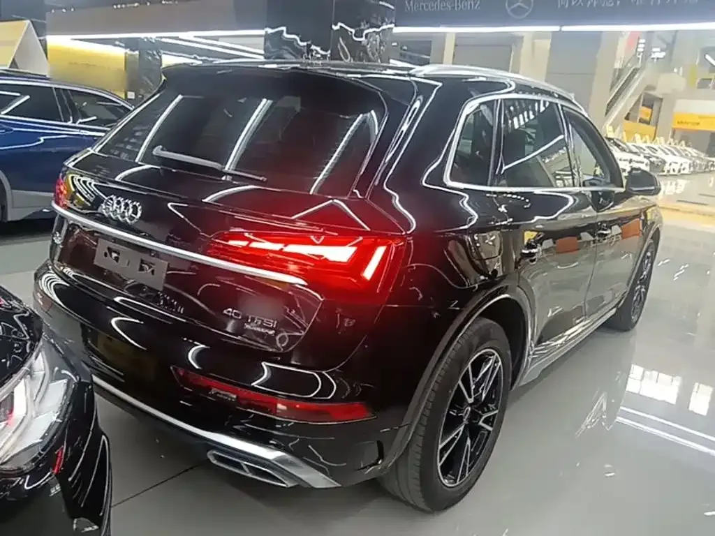 Audi Q5L — фото 7