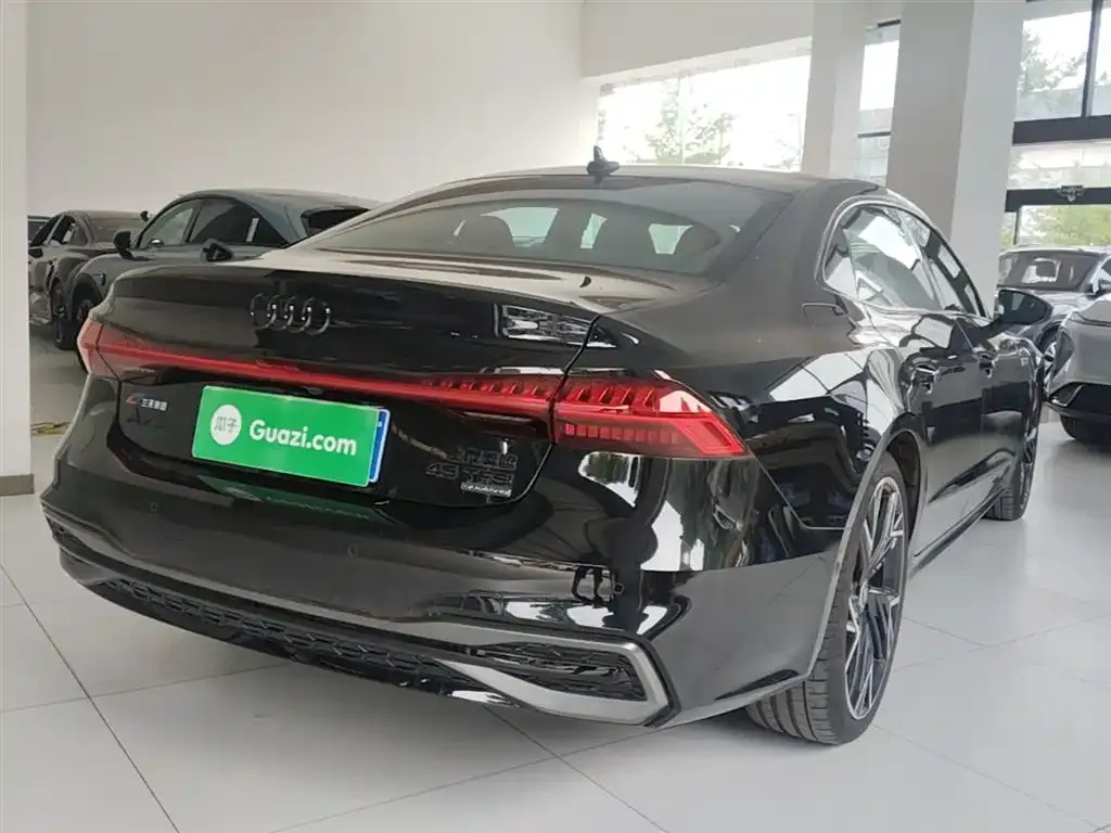 Audi A7L — фото 9