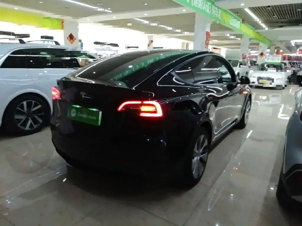 Tesla Model Y — фото 7