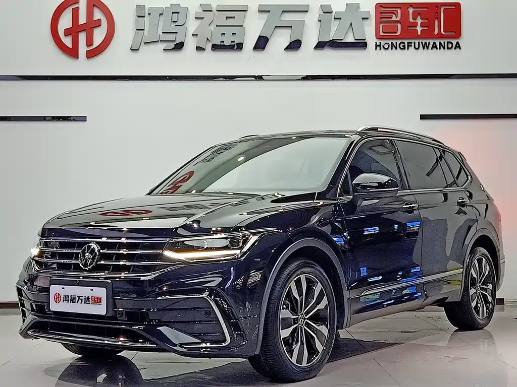 Volkswagen Tiguan L — фото 1