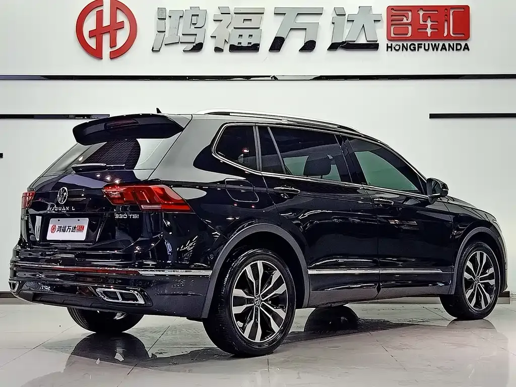 Volkswagen Tiguan L — фото 2
