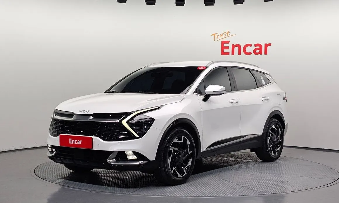 Kia Sportage — фото 1