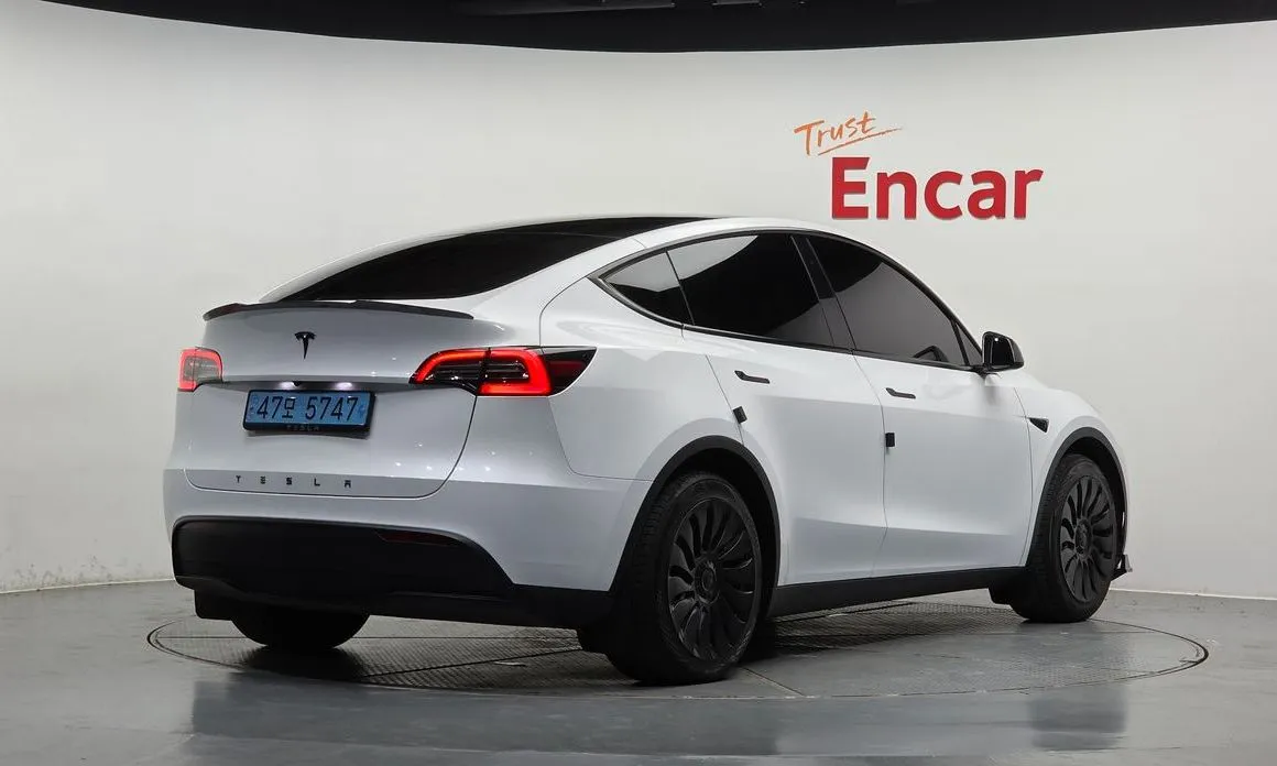 Tesla Model Y — фото 7
