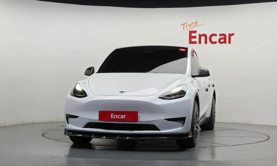 Tesla Model Y — фото 10