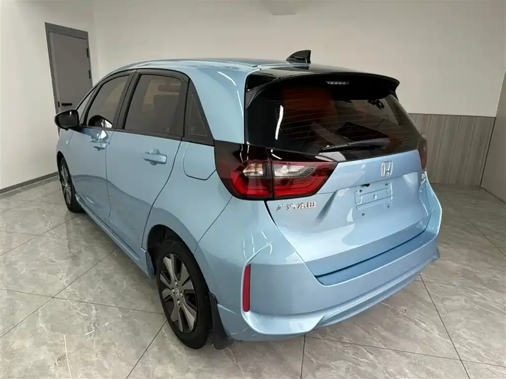 Honda Fit — фото 7