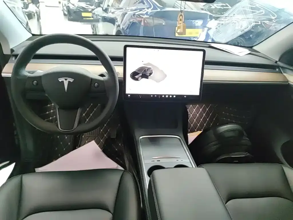 Tesla Model Y — фото 7