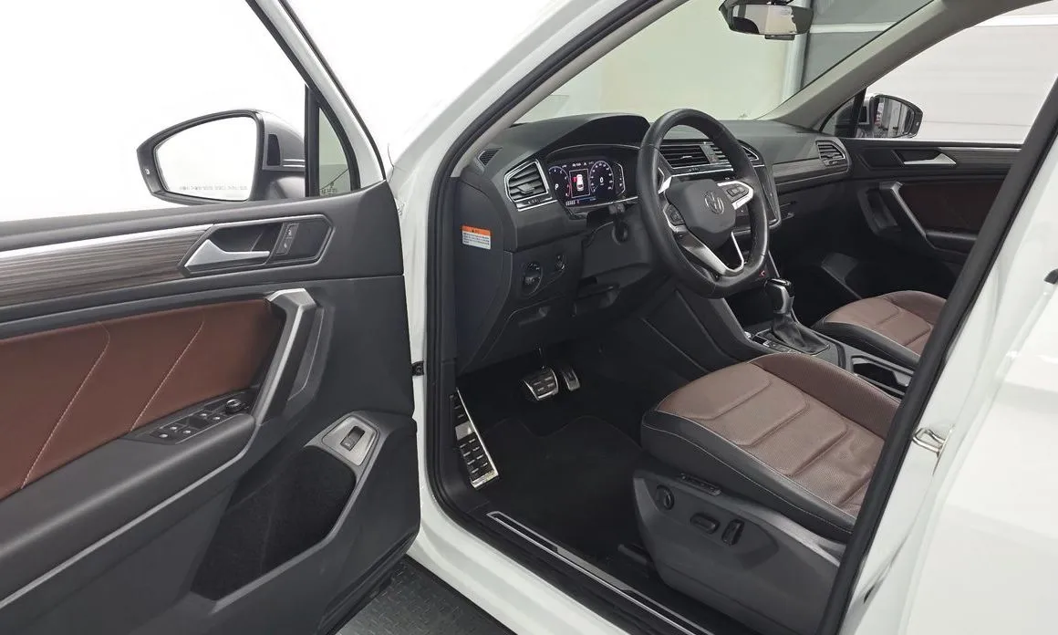 Volkswagen Tiguan — фото 7