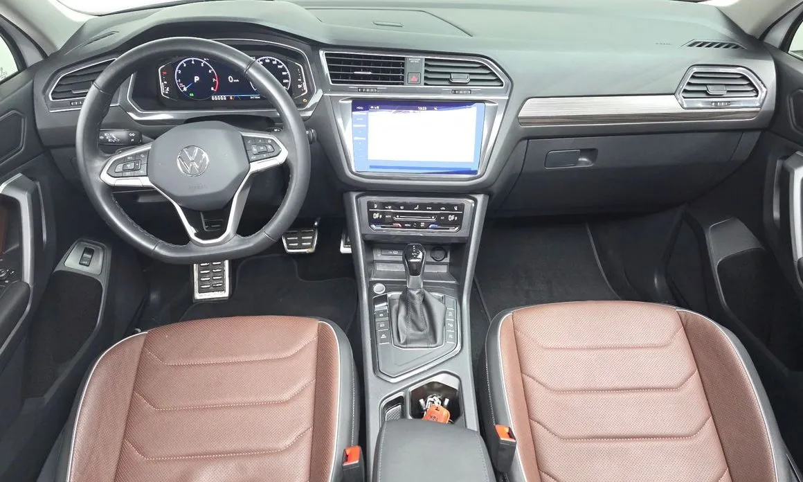 Volkswagen Tiguan — фото 10