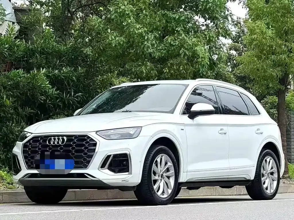 Audi Q5L — фото 9