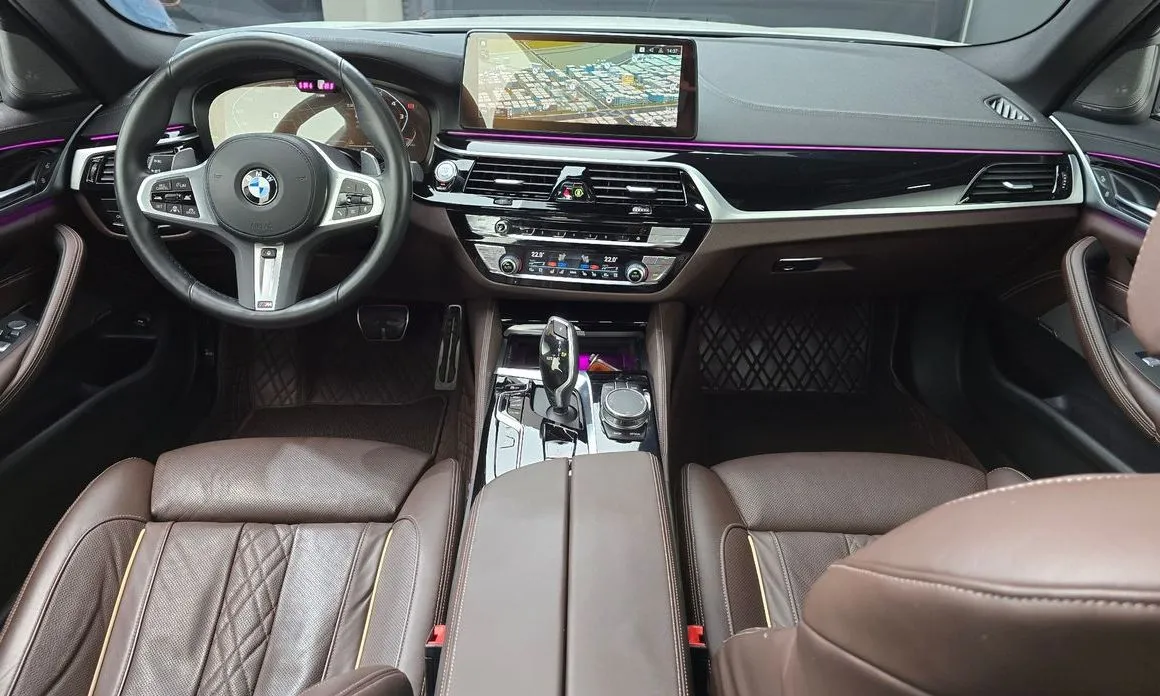 BMW 5-Series — фото 10