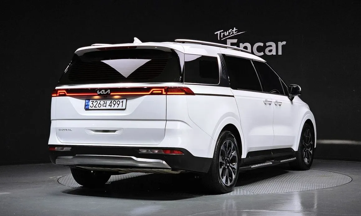Kia Carnival — фото 10