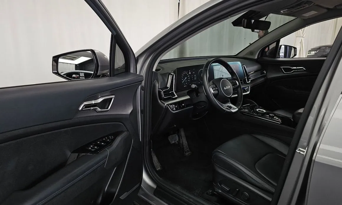 Kia Sportage — фото 8