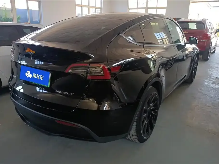 Tesla Model Y — фото 7