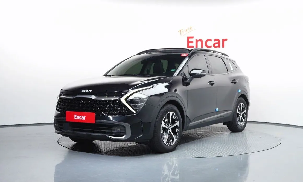 Kia Sportage — фото 1