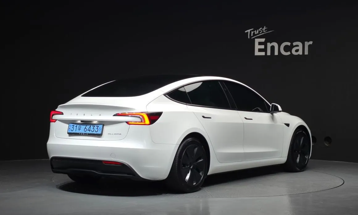 Tesla Model 3 — фото 7