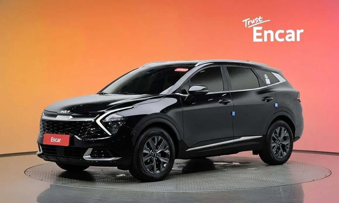 Kia Sportage — фото 1