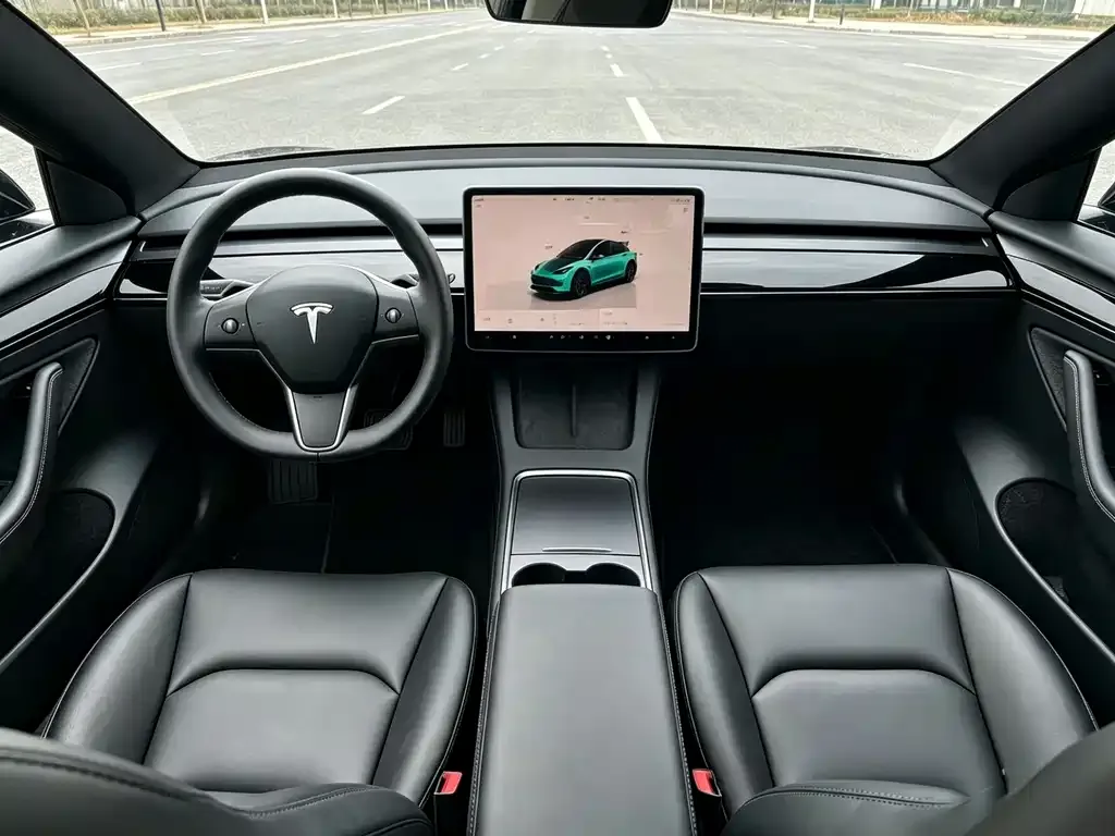 Tesla Model Y — фото 6