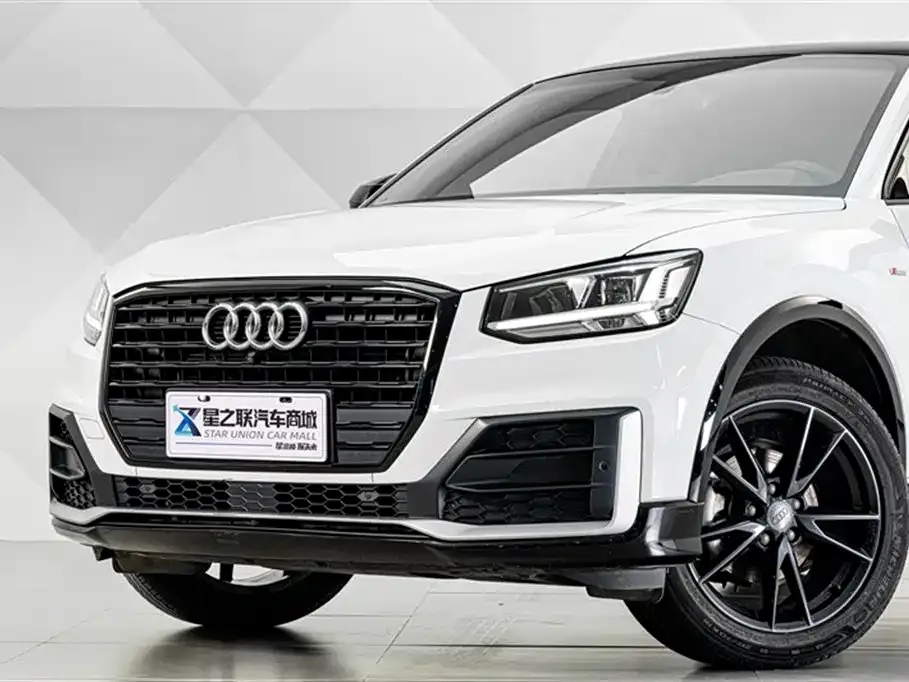 Audi Q2L — фото 9