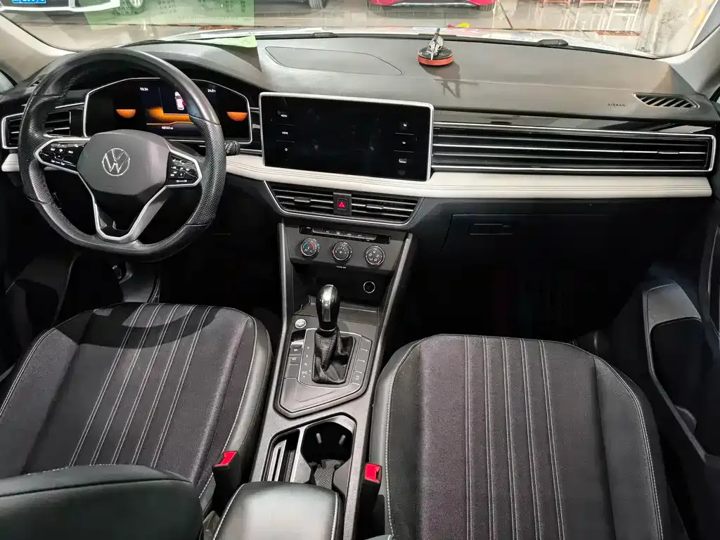 Volkswagen Tiguan L — фото 5