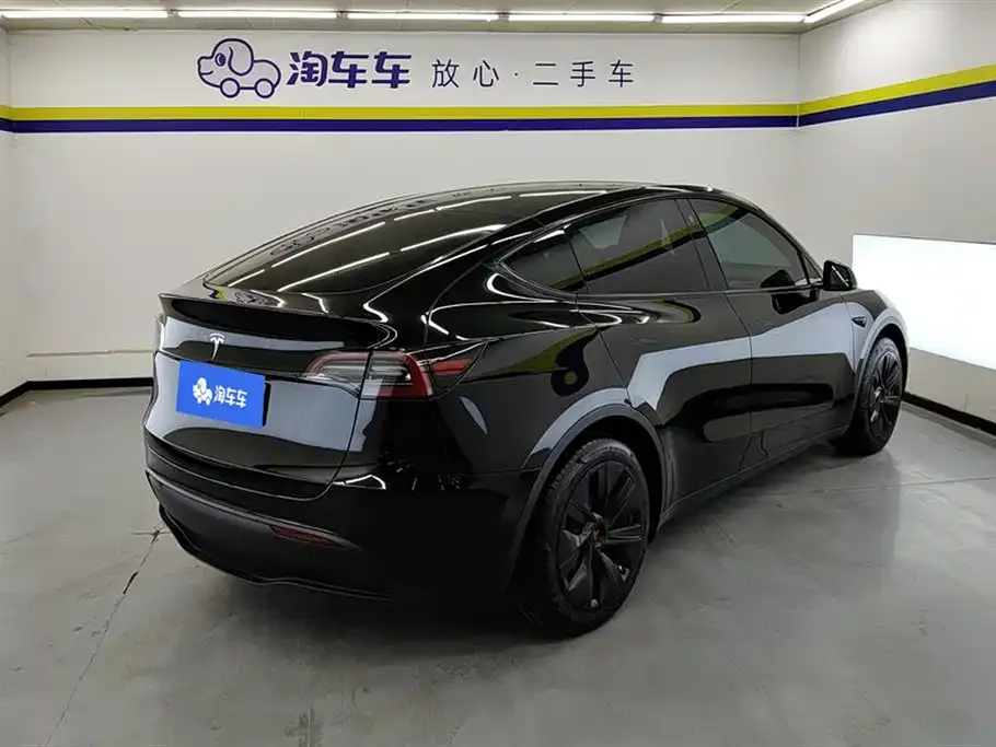 Tesla Model Y — фото 6