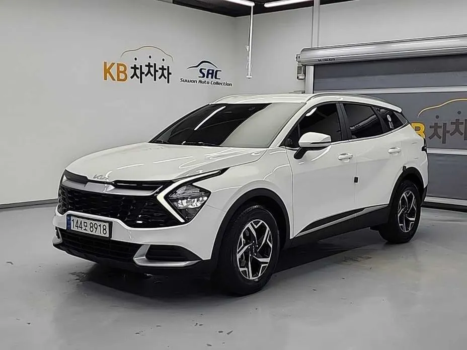 Kia Sportage — фото 1