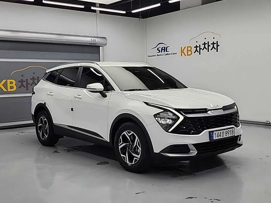 Kia Sportage — фото 9