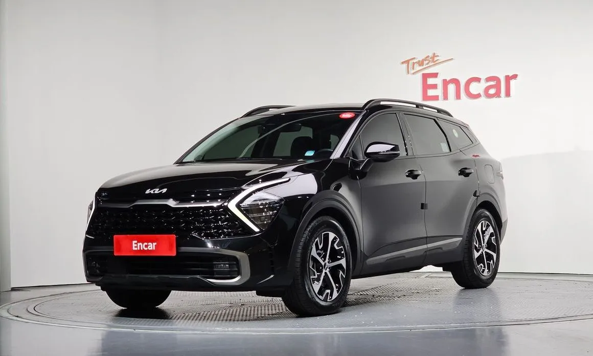Kia Sportage — фото 1