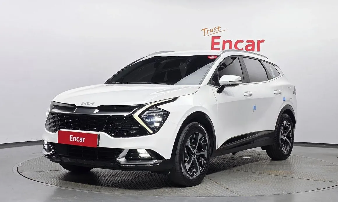 Kia Sportage — фото 1