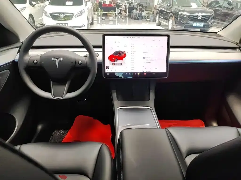 Tesla Model Y — фото 5