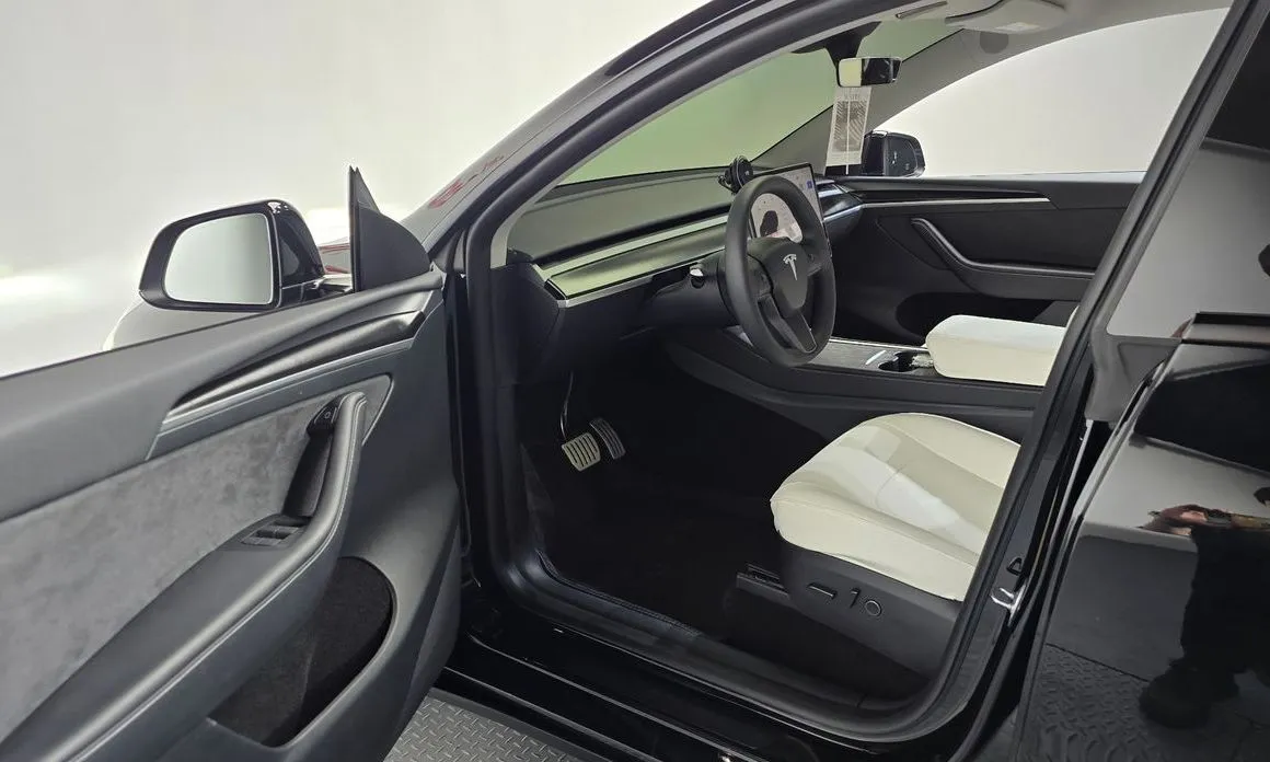 Tesla Model Y — фото 7