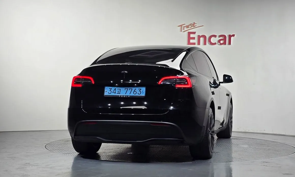 Tesla Model Y — фото 6