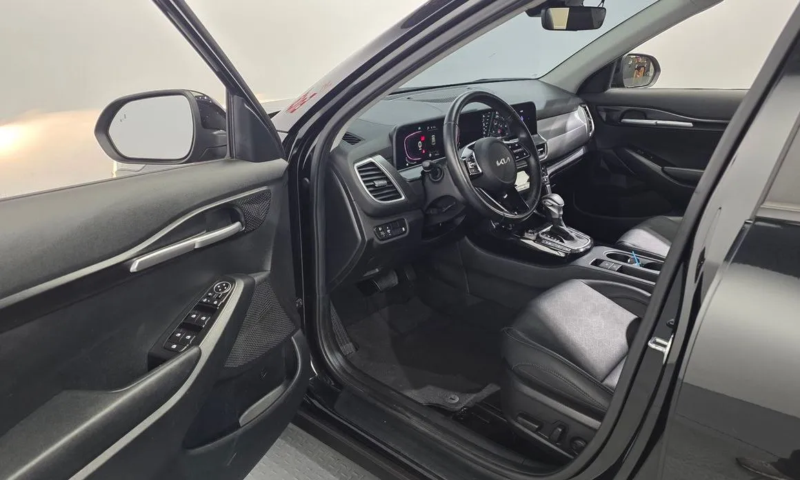 Kia Seltos — фото 7
