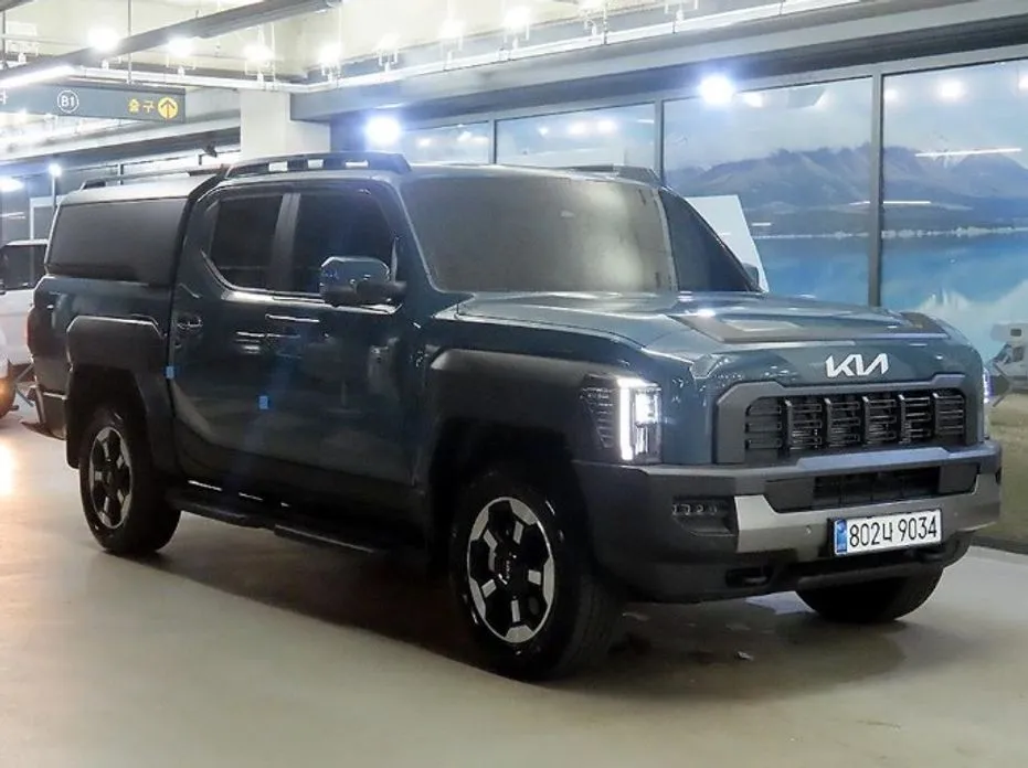 Kia Tasman — фото 1