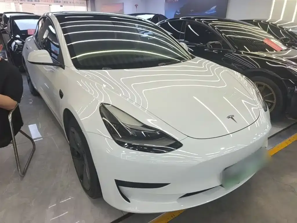 Tesla Model 3 — фото 7