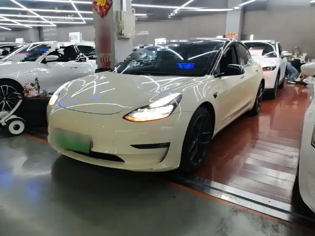 Tesla Model 3 — фото 7
