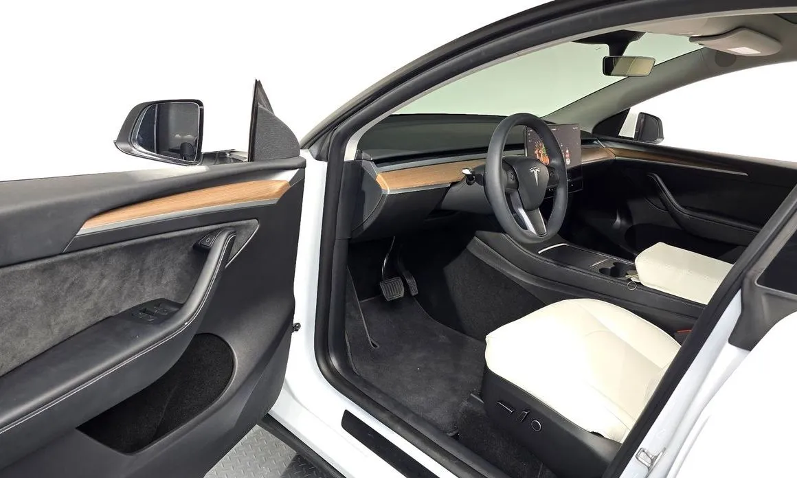 Tesla Model Y — фото 9