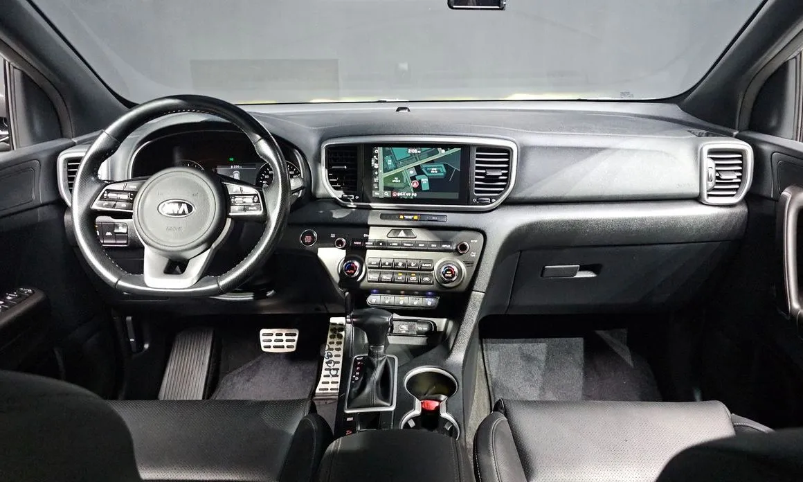 Kia Sportage — фото 8