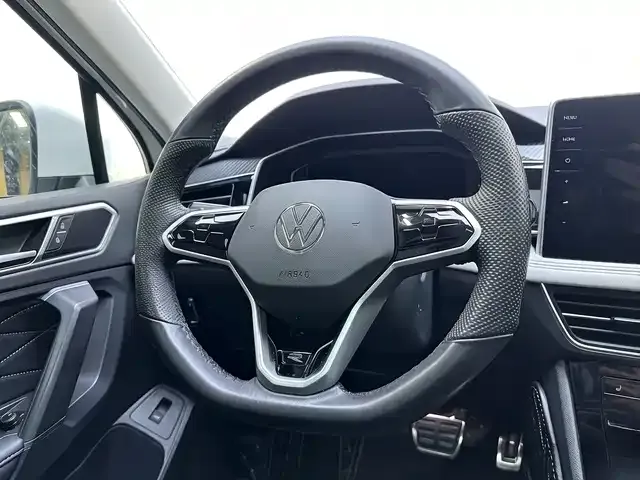 Volkswagen Tiguan L — фото 3