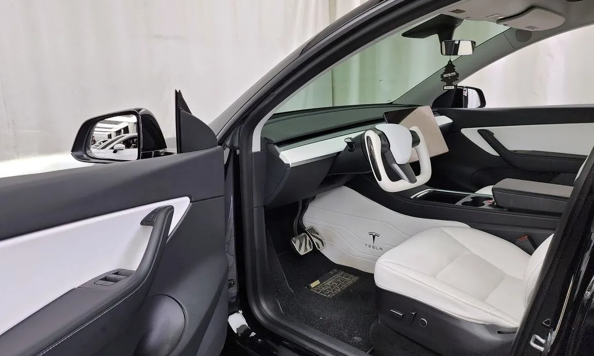Tesla Model Y — фото 7