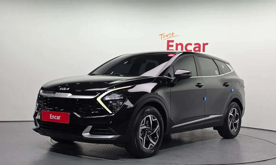 Kia Sportage — фото 1