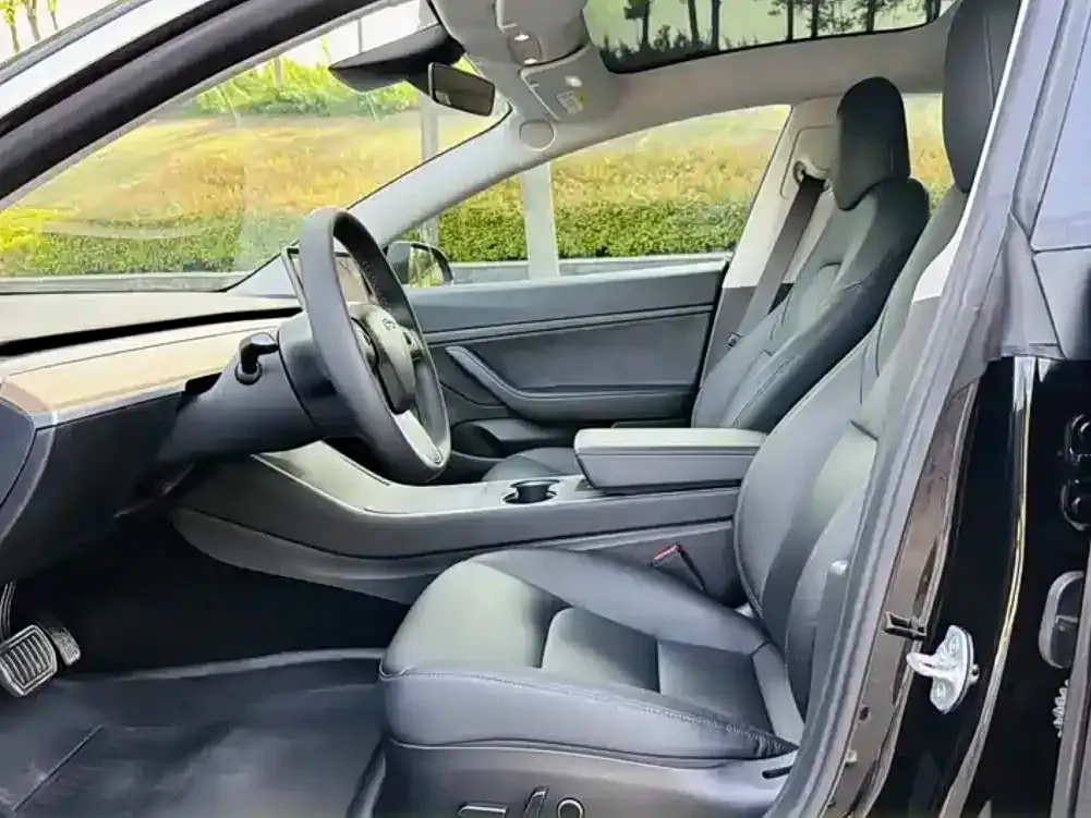 Tesla Model 3 — фото 9
