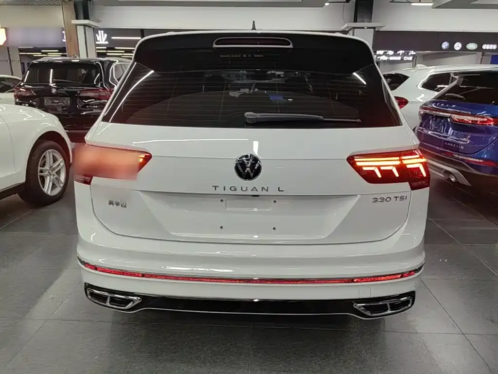 Volkswagen Tiguan L — фото 8