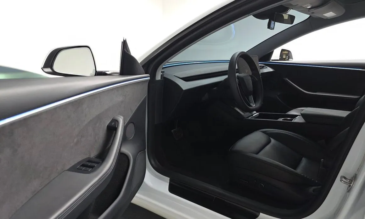 Tesla Model 3 — фото 10