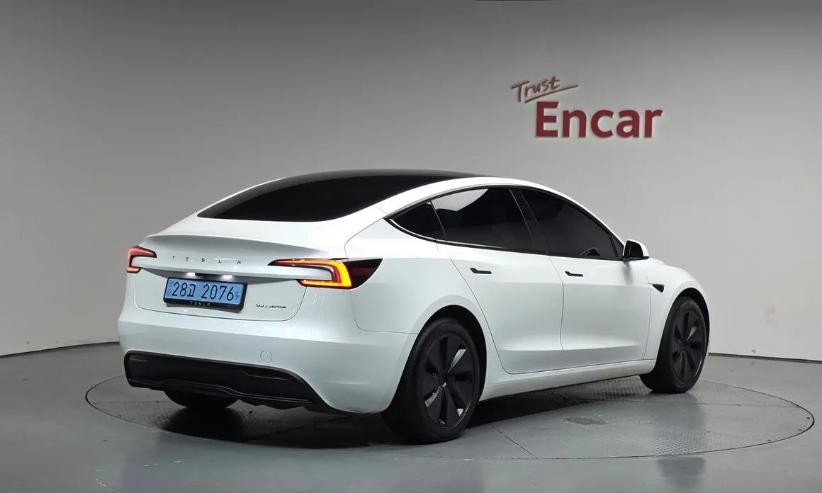 Tesla Model 3 — фото 9