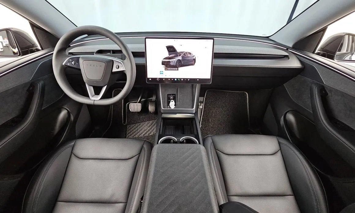 Tesla Model Y — фото 9