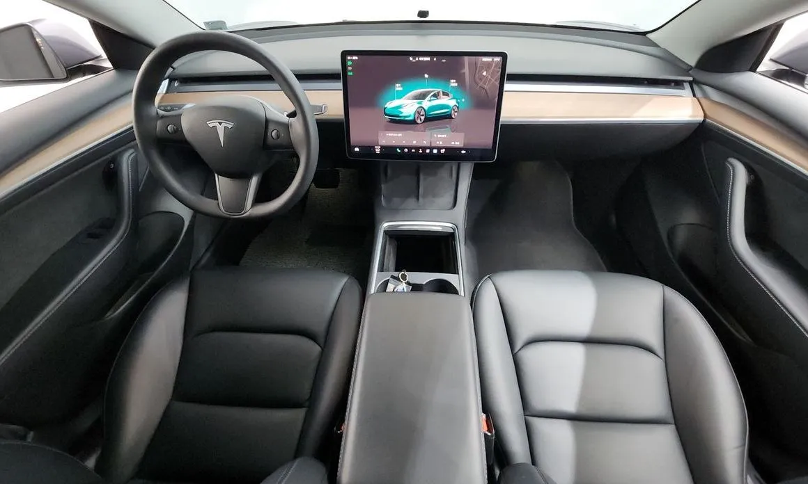 Tesla Model 3 — фото 9