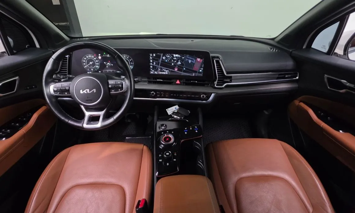 Kia Sportage — фото 10